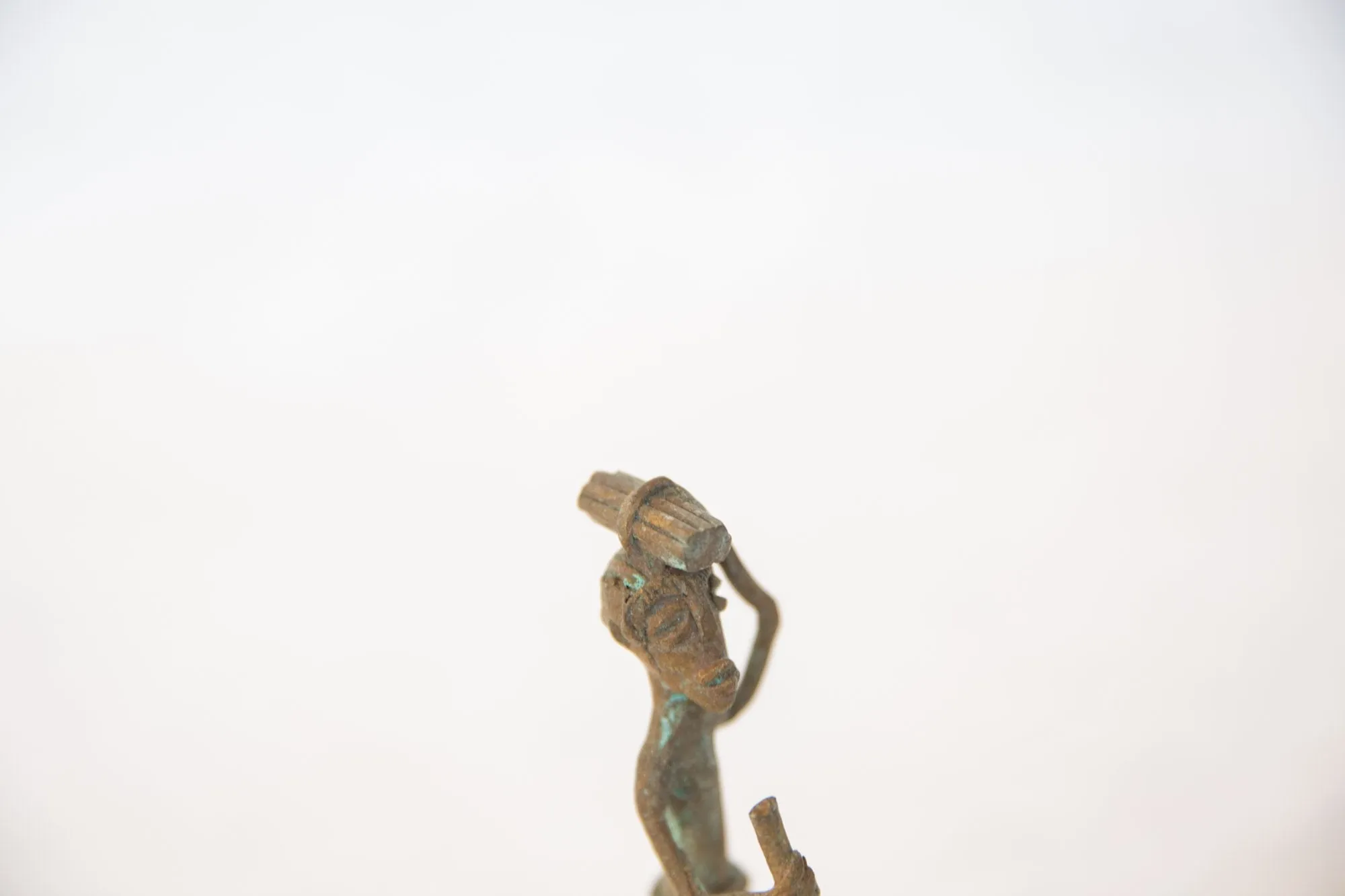 Vintage African Oxidized Copper Person Balancing Item on Head while Walking