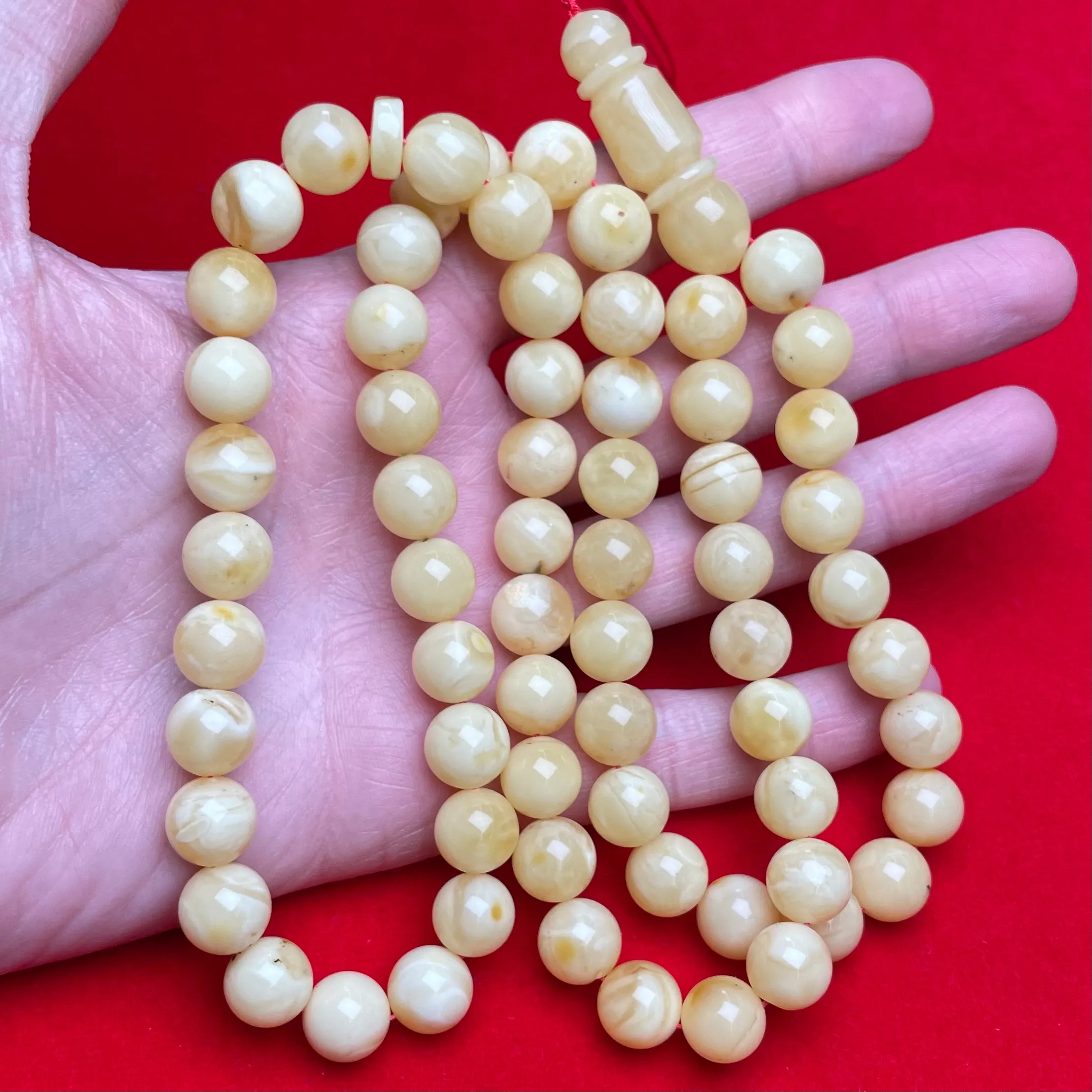 YELLOW/WHITE AMBER MISBAHA 10,8mm 48,7g